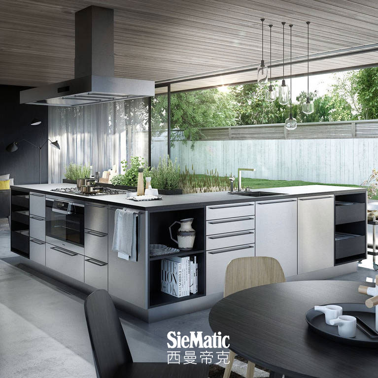 SieMatic Urban SE kitchen island in graphite oak and stainless steel with herb garden and StoneDesign countertop in granite